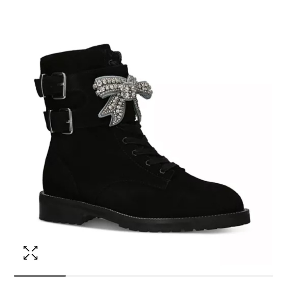 Kurt Geiger embellished bow boots.